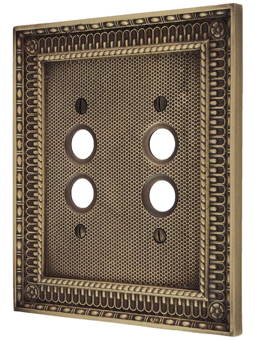Pisano Double Gang Push Button Switch Plate in Antique Brass.